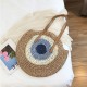 ocean eyes woven straw bag